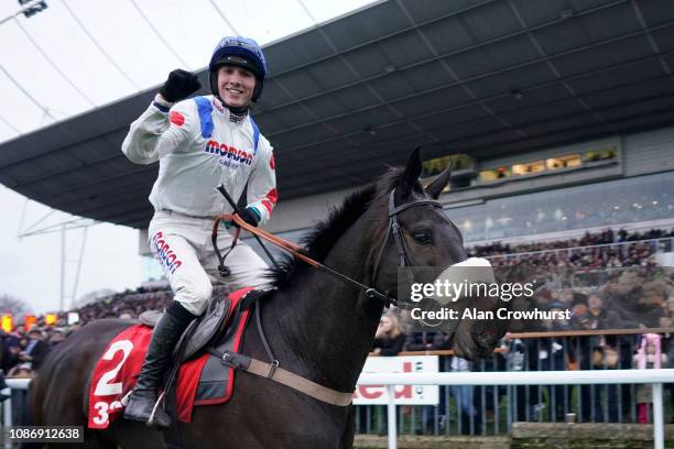 Harry Cobden celebrates after riding Clan des Obeaux to win The 32Red King George VI Chase at Kempton Park on December 26, 2018 in Sunbury, England.