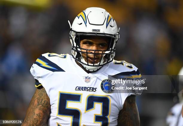 Mike Pouncey of the Los Angeles Chargers warms up prior to the game against the Pittsburgh Steelers at Heinz Field on December 2, 2018 in Pittsburgh,...