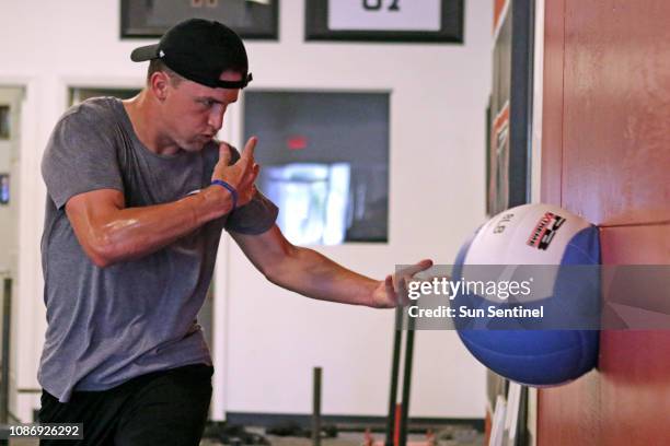 Miami Marlins pitcher Braxton Garrett works out with a medicine ball as part of his rehab program to recover from Tommy John surgery at Cressey...