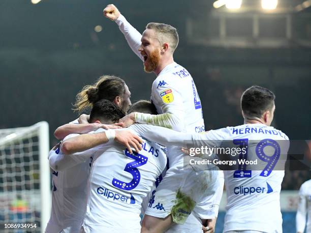 Adam Forshaw of Leeds United leads celebrations after the opening goal an own goal scored by Derrick Williams during the Sky Bet Championship match...