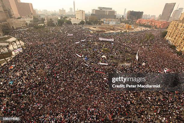 Protestors gather in Tahrir Square on February 1, 2011 in Cairo, Egypt. Protests in Egypt continued with the largest gathering yet, with many tens of...