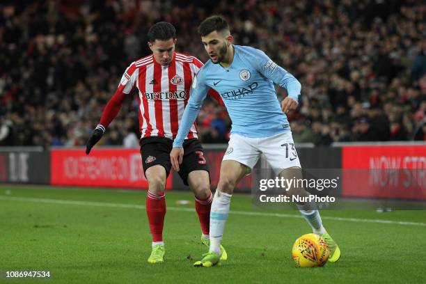 Benjamn Garr of Manchester City and Adam Matthews of Sunderland in action during the Checkatrade Trophy Quarter Final match between Sunderland and...