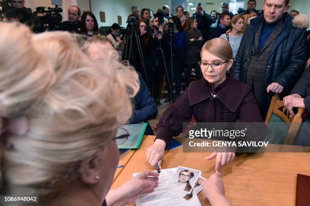 Former Ukrainian Prime Minister Yulia Tymoshenko submits documents to the Ukraines Central Electoral Commission in Kiev, on January 23, 2019. -...