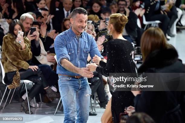 Celine Dion gives Designer Alexandre Vauthier a standing ovation during the finale of the Alexandre Vauthier Spring Summer 2019 show as part of Paris...