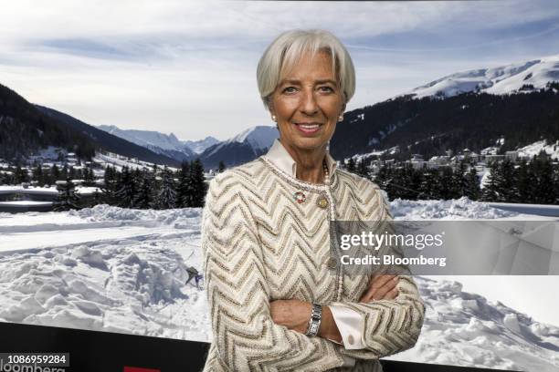 Christine Lagarde, managing director of the International Monetary Fund , poses for a photograph following a Bloomberg Television interview on day...