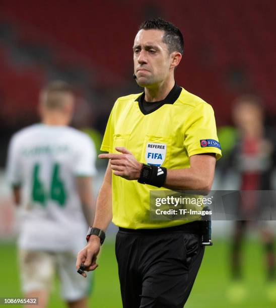 Referee Dennis Higler gestures during the UEFA Europa League Group A match between Bayer 04 Leverkusen and Ludogorets at BayArena on November 29,...