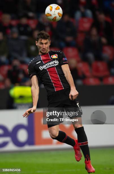 Lucas Alario of Bayer 04 Leverkusen jumps to meet the ball with his head during the UEFA Europa League Group A match between Bayer 04 Leverkusen and...