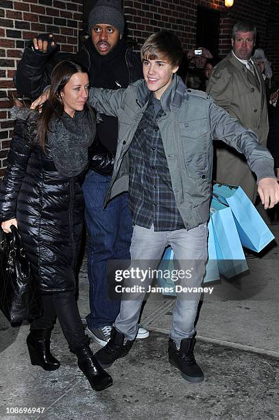 Justin Bieber and his mother Pattie Mallette visit "Late Show With David Letterman" at the Ed Sullivan Theater on January 31, 2011 in New York City.