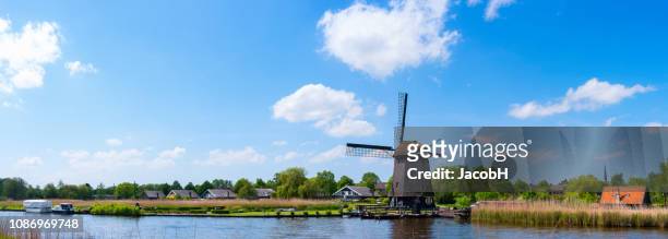 holländische windmühle - nordholland stock-fotos und bilder