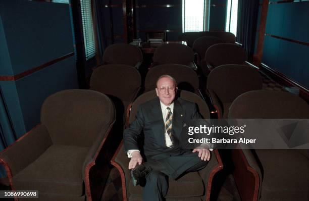 Portrait of American record producer and music executive Clive Davis as he sits in his home theater, New York, New York, April 3, 1997.