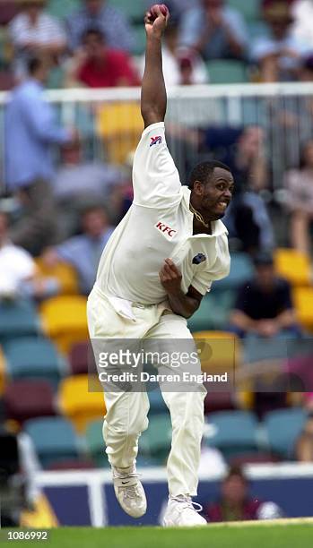 Courtney Walsh of the West Indies bowls during the second day of the First Test match between Australia and West Indies at The Gabba cricket ground...