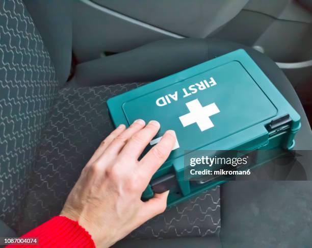 car first aid kit - first aid kit stock-fotos und bilder