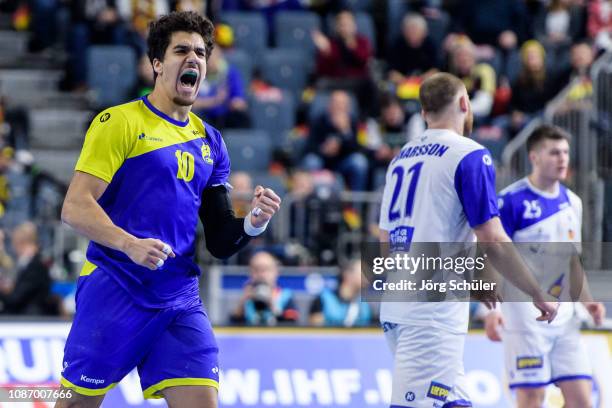 Jose Toledo celebrates during the Main Group 1 match at the 26th IHF Men's World Championship between Brazil and Iceland at the Lanxess Arena on...