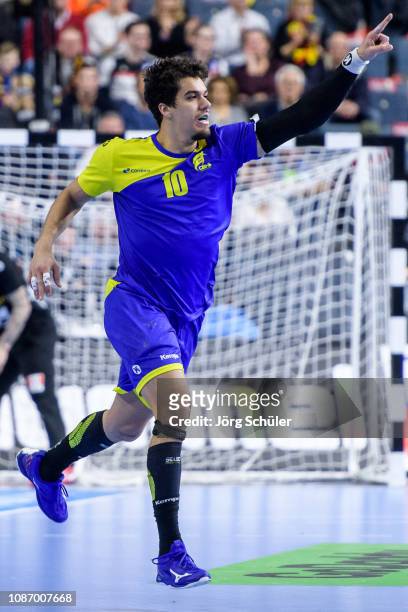 Jose Toledo celebrates during the Main Group 1 match at the 26th IHF Men's World Championship between Brazil and Iceland at the Lanxess Arena on...