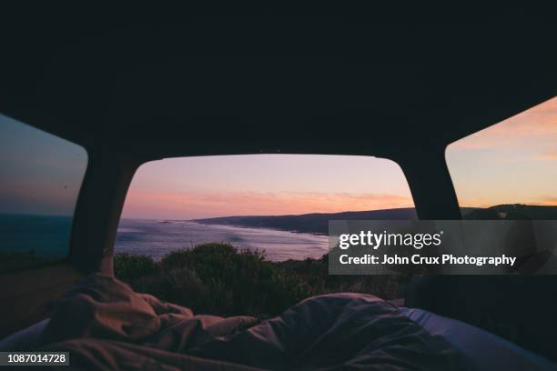 coast roadtrip - sleeping in car stock pictures, royalty-free photos & images