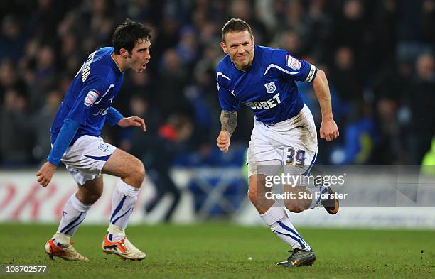 Cardiff striker Craig Bellamy celebrates with Peter Whittingham after scoring a last second goal to draw the game during the npower Championship...