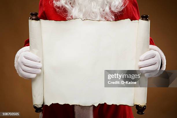 santa natale - lista foto e immagini stock