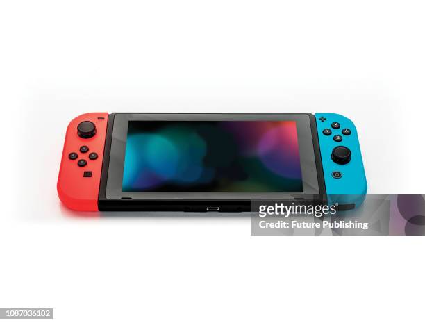 Nintendo Switch console fitted with a pair of Joy-Con controllers, taken on February 24, 2017.