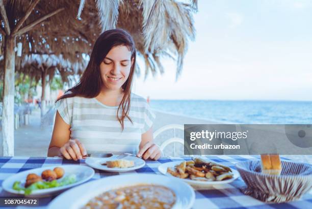 dinner by the sea - beach bowl stock pictures, royalty-free photos & images