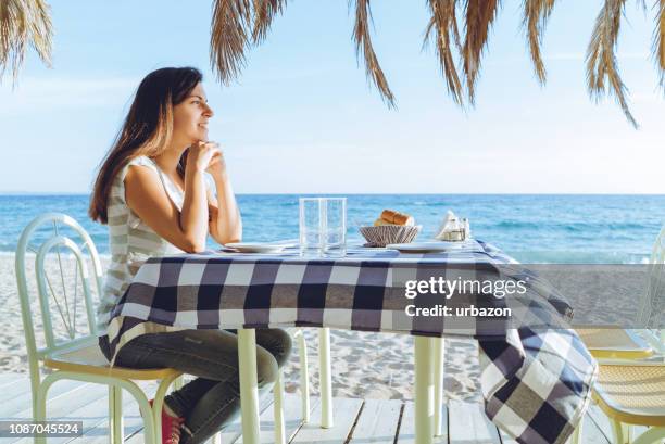 dinner by the sea - beach bowl stock pictures, royalty-free photos & images