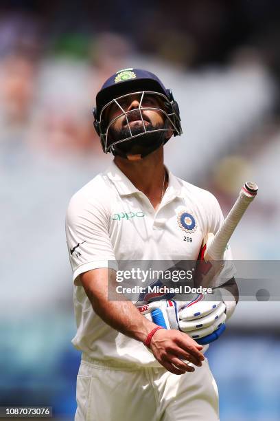 Virat Kohli of India look dejected after his dismissal during day two of the Third Test match in the series between Australia and India at Melbourne...