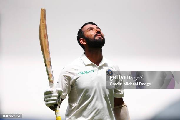 Century maker Cheteshwar Pujara of India looks to the sky after his dismissal during day two of the Third Test match in the series between Australia...