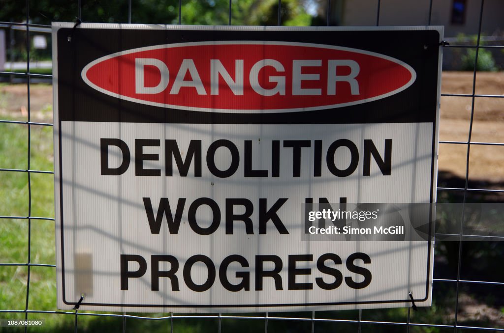Demolition Work Sign Danger Demolition Work In Progress Sign On A Wire Fence Around A ...