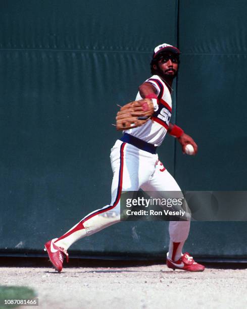 Harold Baines of the Chicago White Sox fields during an MLB game at Comiskey Park in Chicago, Illinois. Baines played for the White Sox from...