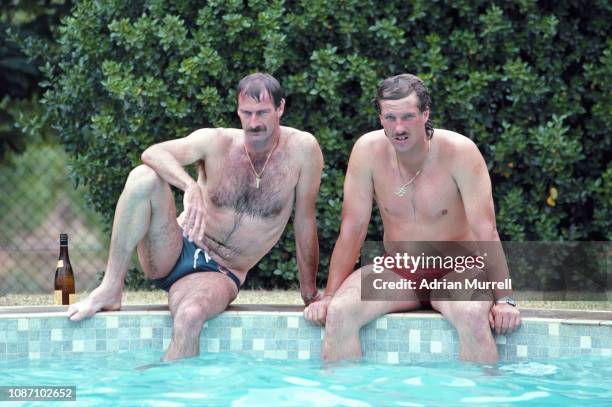 Dennis Lillee of Australia and Ian Botham of England relax by the swimming pool at Yalumba winery on the rest day of the Adelaide Test match between...