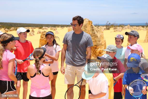 Roger Federer interacts with junior tennis players at the Pinnacles Desert ahead of the 2019 Hopman Cup on December 27, 2018 in Cervantes, Australia.