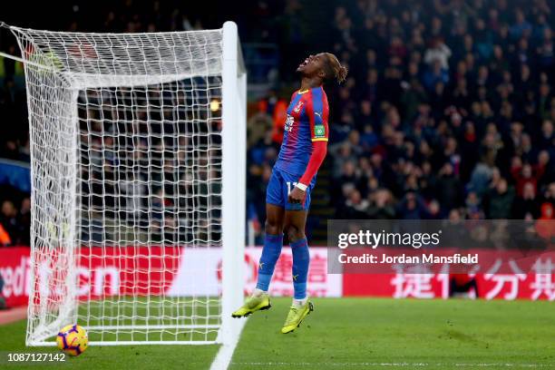 Wilfried Zaha of Crystal Palace reacts after a missed chance during the Premier League match between Crystal Palace and Cardiff City at Selhurst Park...