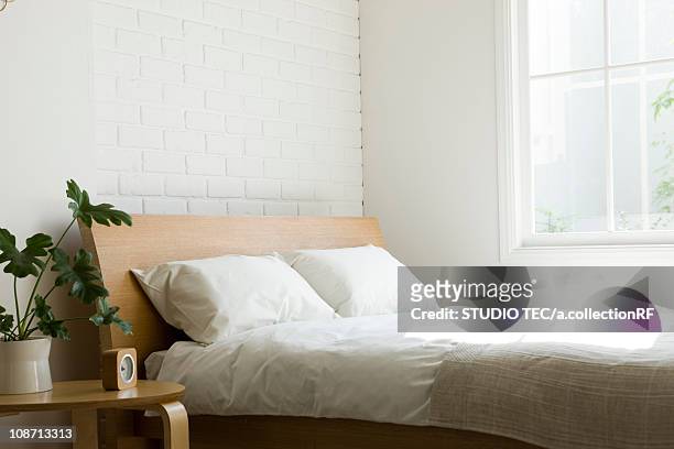 bedroom - side table stock pictures, royalty-free photos & images