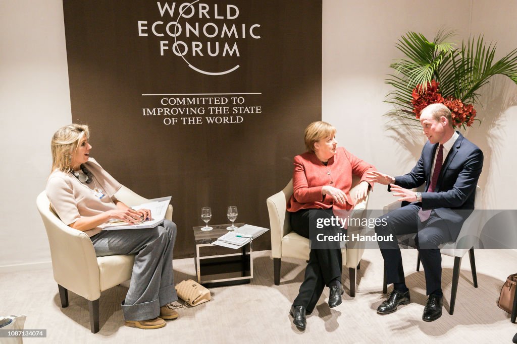 German Chancellor Angela Merkel meets Prince William And Queen Maxima of the Netherlands In Davos