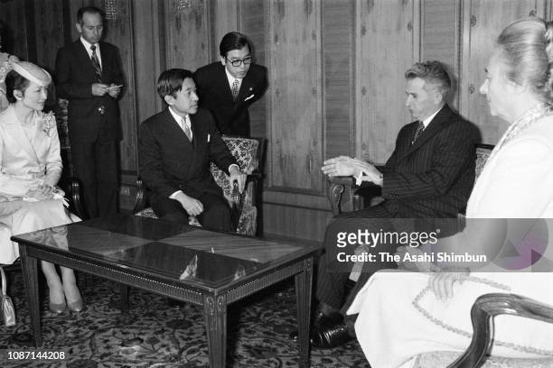 Crown Prince Akihito and Crown Princess Michiko talk with Romania President Nicolae Ceausescu and his wife Elena during their meeting on October 8,...