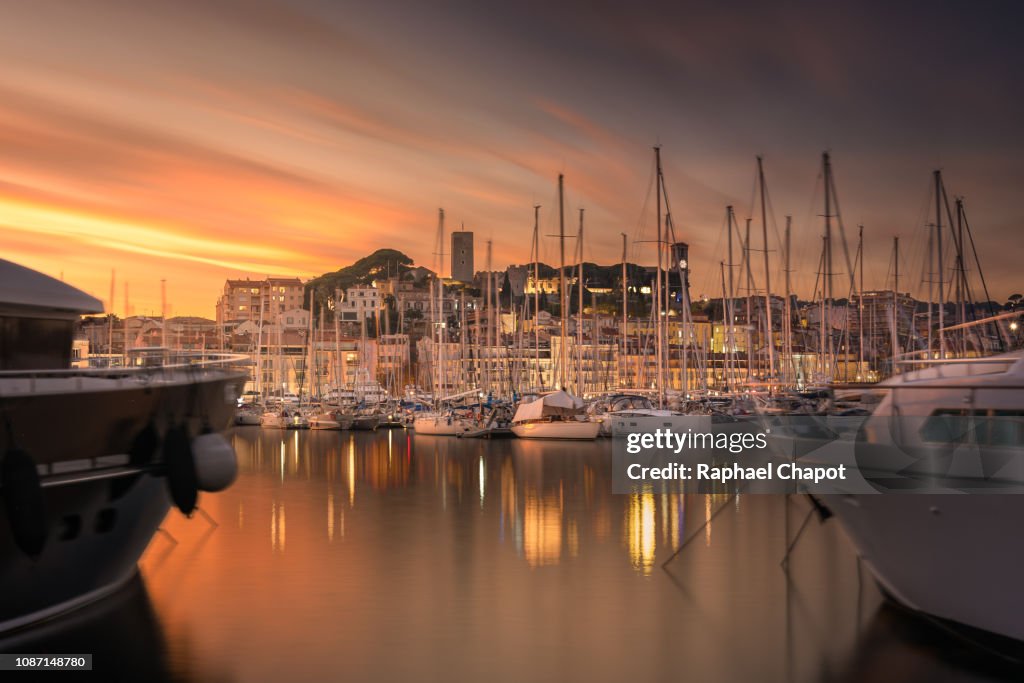 Photograph of Cannes and it marina during sunset. French Riviera, France