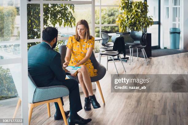 during consultation. - new zealand yellow stock pictures, royalty-free photos & images