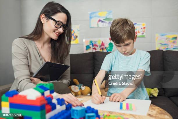 child psychologist at work - alternative therapy stock pictures, royalty-free photos & images