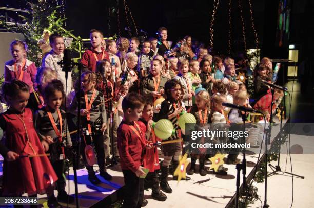 christmas  concert - kids singing stock pictures, royalty-free photos & images