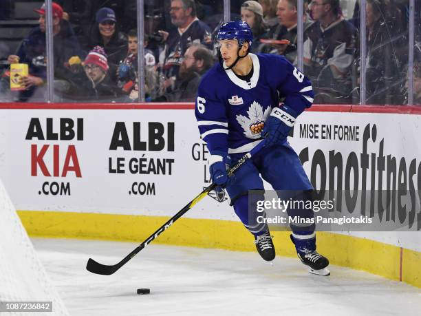 Steven Oleksy of the Toronto Marlies skates the puck against the Laval Rocket during the AHL game at Place Bell on December 22, 2018 in Laval,...