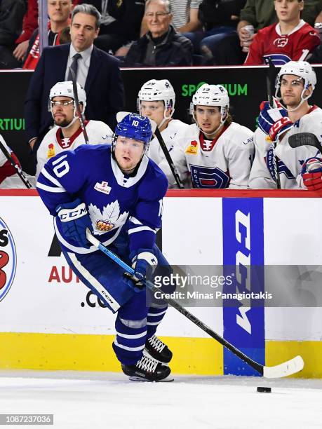 Carl Grundstrom of the Toronto Marlies skates the puck against the Laval Rocket during the AHL game at Place Bell on December 22, 2018 in Laval,...
