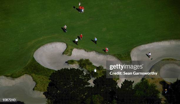 General view of Aaron Baddeley hitting out of the rough during the 2000 Holden Australian Open Golf tournament at Kingston Heath Golf course in...