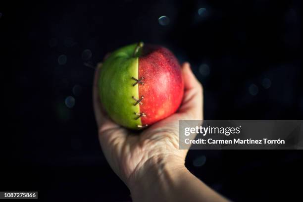 apple that symbolizes healing. - aumento dos seios imagens e fotografias de stock