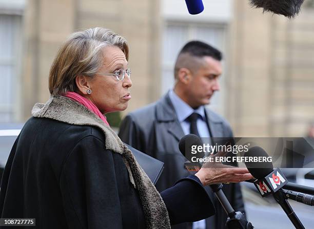 France's Foreign Affairs Minister Michele Alliot-Marie speaks to the press as she leaves the Elysee Palace after the weekly cabinet meeting on...