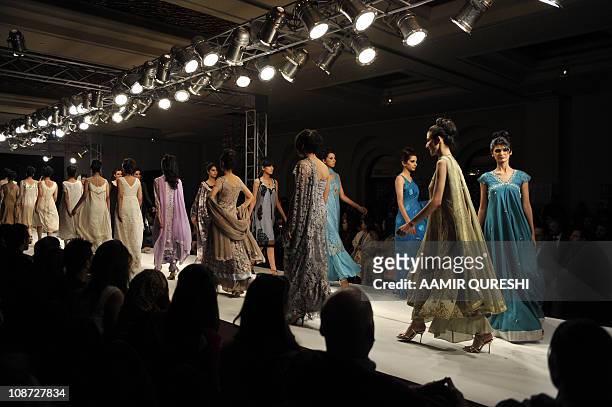 Pakistani models present creations by Pakistani designer Bizma during the second day of Islamabad Fashion Week in Islamabad on January 28, 2011. Some...