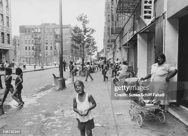 Street scene in Harlem, New York City, circa 1970.