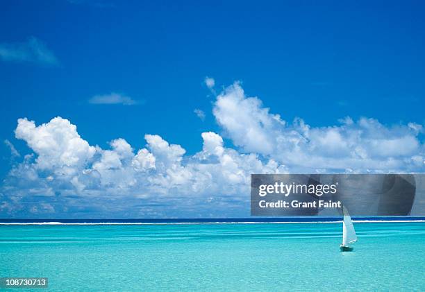 small sailboat in lagoon. - smooth sailing stock pictures, royalty-free photos & images