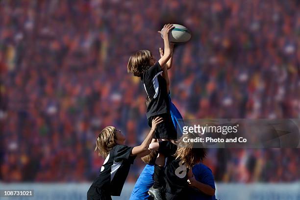 boys rugby players in a lineout - kids rugby stock pictures, royalty-free photos & images