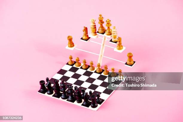 3d chess board and chess pieces on that - spielregeln stock-fotos und bilder