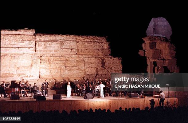 The Arab world's most renowned living singer Fairuz performs at the pyramids of Giza outside Cairo in July 1989. Fairuz gave a sell-out concert in...