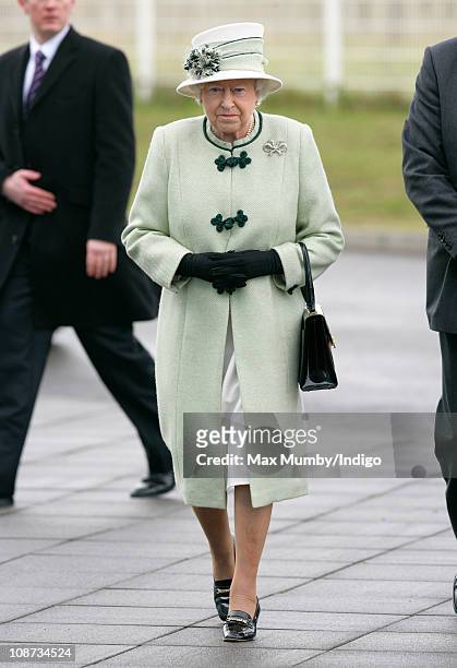 Queen Elizabeth II arrives at the Palm Paper mill on February 2, 2011 in Norwich, England. The Queen and the Duke of Edinburgh are visiting several...